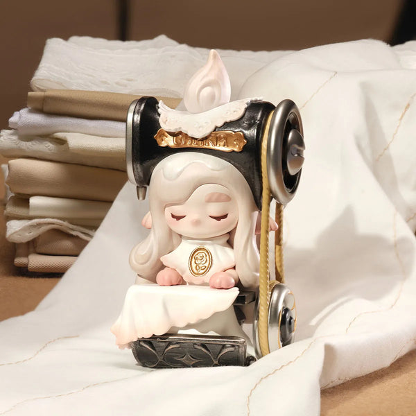 CHAKA Click-Clack Time Machine figur med symaskin-tema