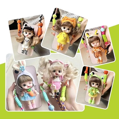 Halsstrop / reim for mobil med dukke.